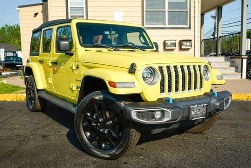 Yellow 2023 Jeep Wrangler 4xe Sport S
