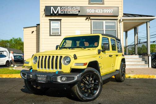 Yellow 2023 Jeep Wrangler 4xe Sport S