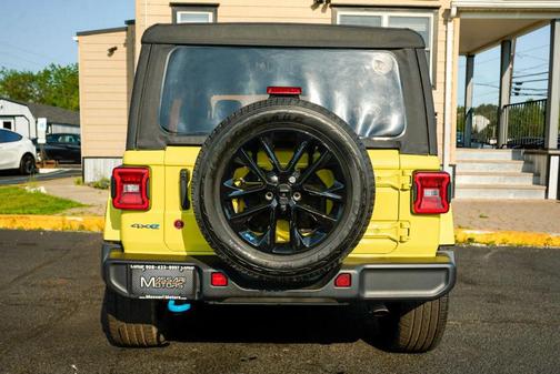 Yellow 2023 Jeep Wrangler 4xe Sport S