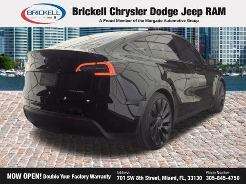 Solid Black 2025 Tesla Model Y Performance Dual Motor All-Wheel Drive