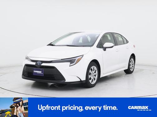 White 2023 Toyota Corolla Hybrid LE