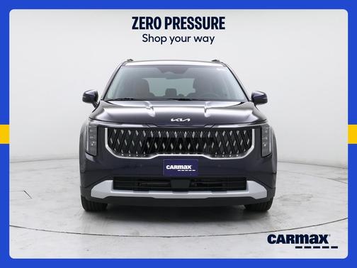 Blue 2026 Kia Carnival Hybrid EX