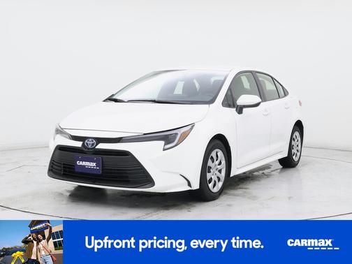 White 2023 Toyota Corolla Hybrid LE