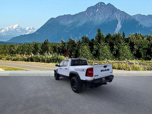 Bright White Clearcoat 2026 RAM 1500 RHO Crew Cab 4x4 5'7' Box