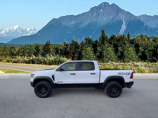 Bright White Clearcoat 2026 RAM 1500 RHO Crew Cab 4x4 5'7' Box