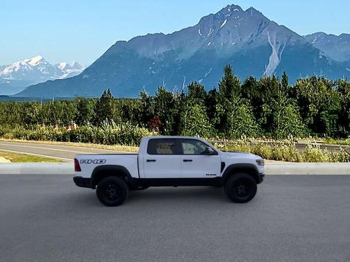 Bright White Clearcoat 2026 RAM 1500 RHO Crew Cab 4x4 5'7' Box