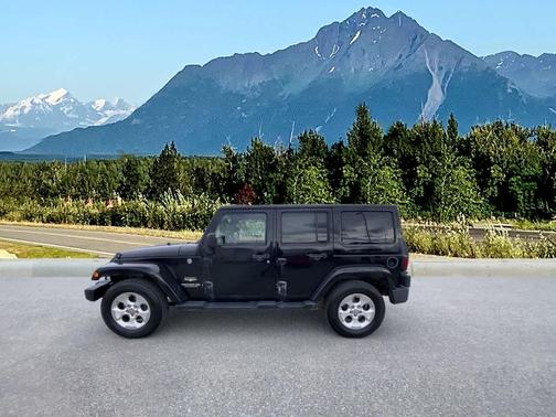 Black 2013 Jeep Wrangler Unlimited Sahara