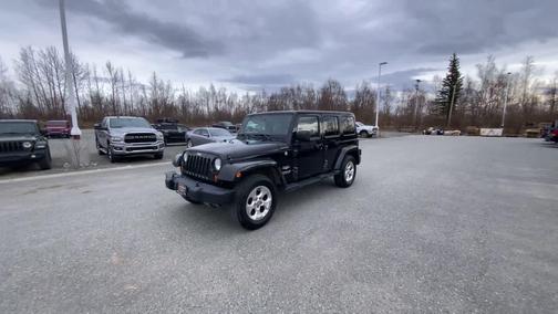 Black 2013 Jeep Wrangler Unlimited Sahara