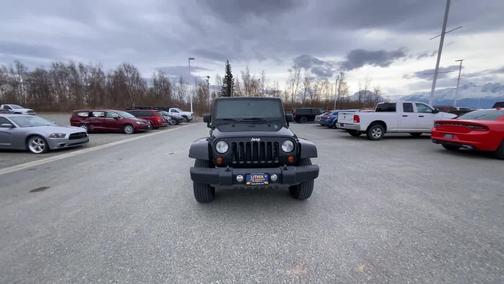 Black 2013 Jeep Wrangler Unlimited Sahara