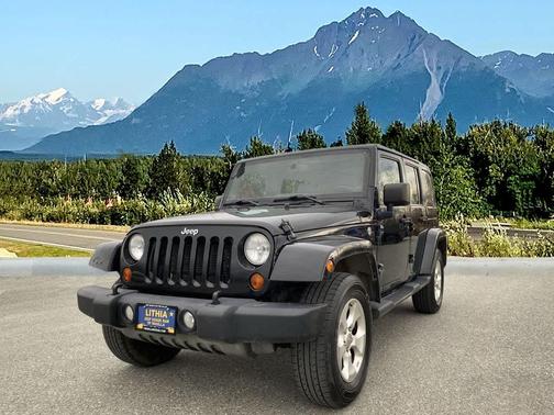 Black 2013 Jeep Wrangler Unlimited Sahara