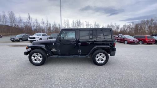 Black 2013 Jeep Wrangler Unlimited Sahara
