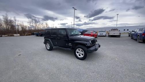 Black 2013 Jeep Wrangler Unlimited Sahara