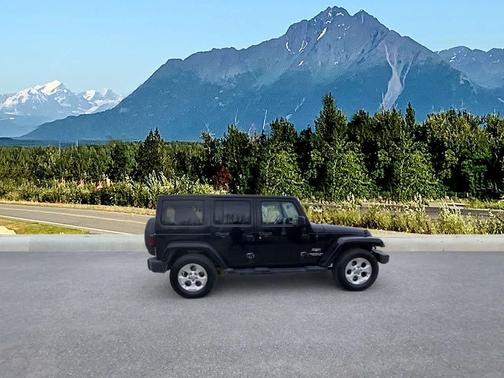 Black 2013 Jeep Wrangler Unlimited Sahara