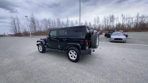Black 2013 Jeep Wrangler Unlimited Sahara