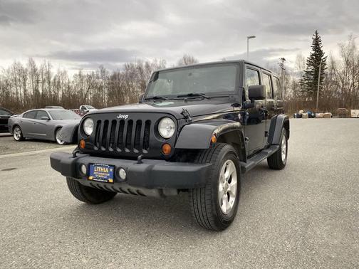 Black 2013 Jeep Wrangler Unlimited Sahara