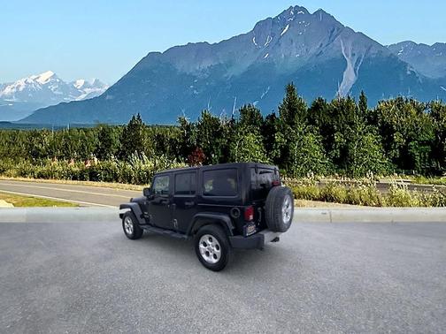 Black 2013 Jeep Wrangler Unlimited Sahara