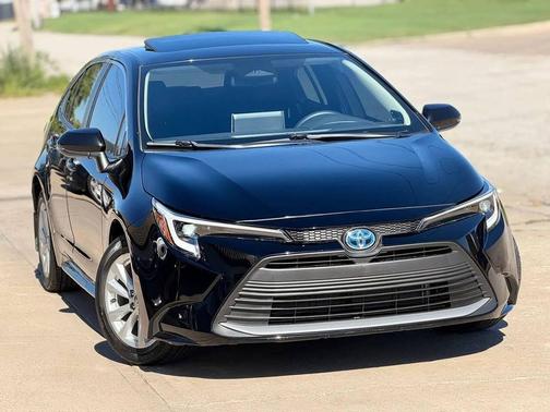 Midnight Black Metallic 2025 Toyota Corolla Hybrid SE