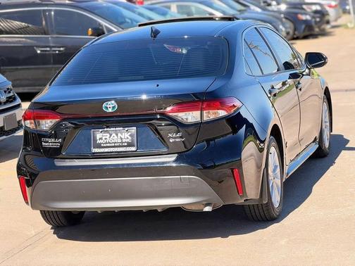 Midnight Black Metallic 2025 Toyota Corolla Hybrid SE