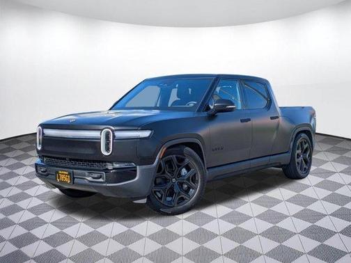 Black 2025 Rivian R1T Adventure Package