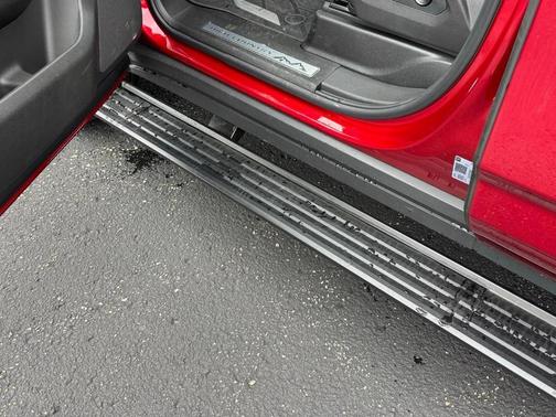 Radiant Red 2026 Chevrolet Suburban High Country