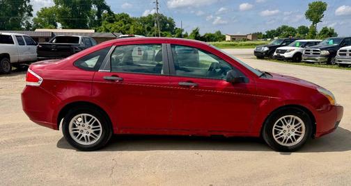 Red 2010 Ford Focus SE