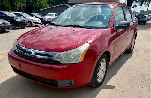 Red 2010 Ford Focus SE