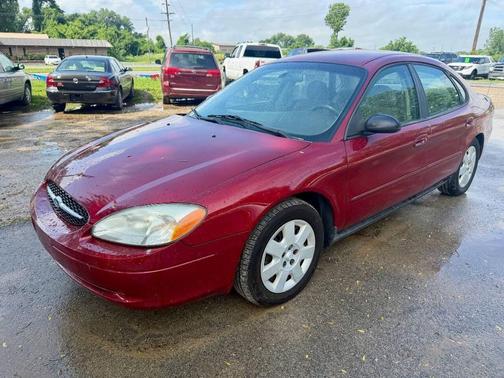 Red 2002 Ford Taurus LX 4dr Sedan