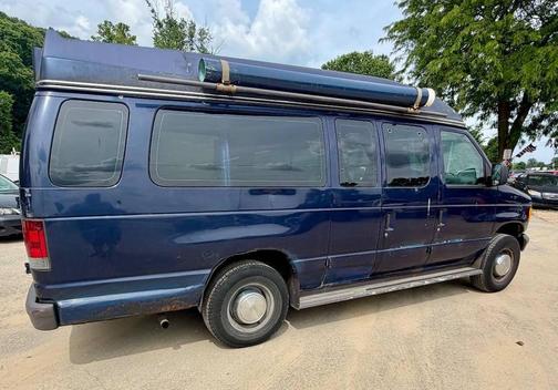Blue 2006 Ford E250 Cargo