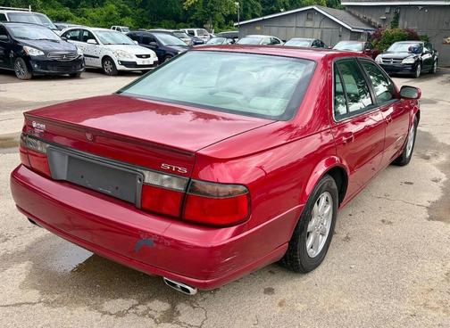 Red 1998 Cadillac Seville Base