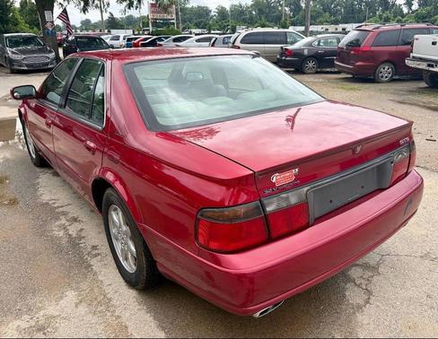 Red 1998 Cadillac Seville Base
