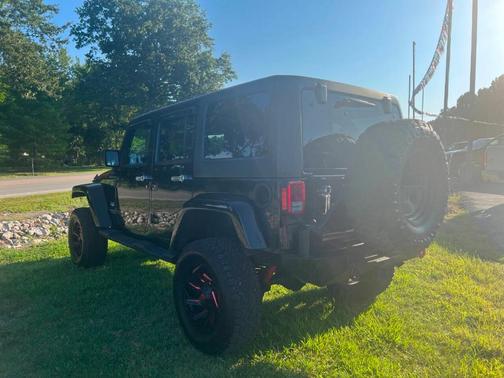 Black 2015 Jeep Wrangler Unlimited Sahara