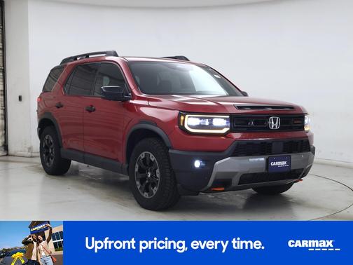 Red 2026 Honda Passport TrailSport Elite