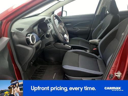 Red 2025 Nissan Versa SV