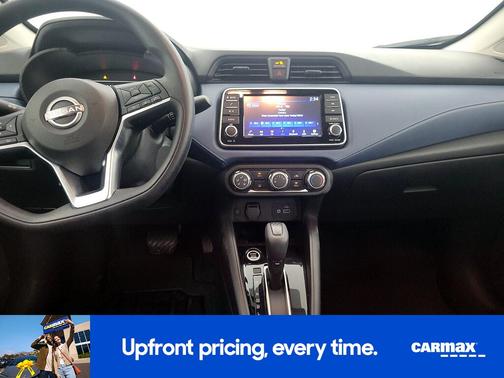 Red 2025 Nissan Versa SV