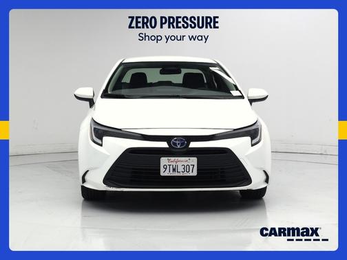 White 2025 Toyota Corolla Hybrid LE