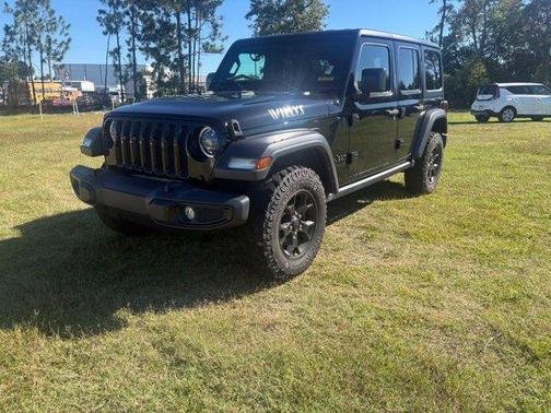 Black 2023 Jeep Wrangler Sport