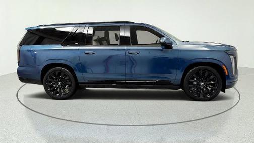 Deep Sea Metallic 2026 Cadillac Escalade ESV Platinum Sport