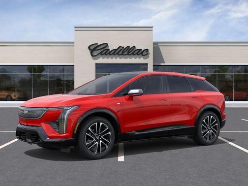 Orange 2026 Cadillac OPTIQ Sport