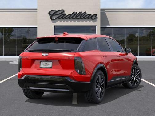 Orange 2026 Cadillac OPTIQ Sport