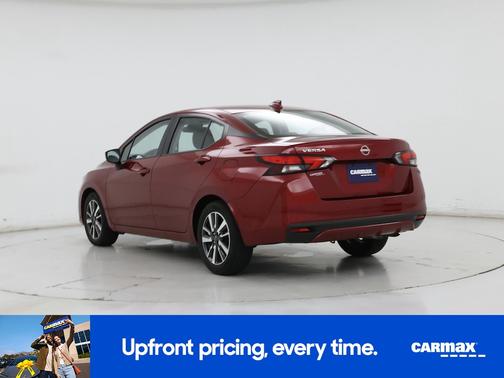 Red 2025 Nissan Versa SV