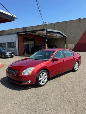 Red 2004 Nissan Maxima SE