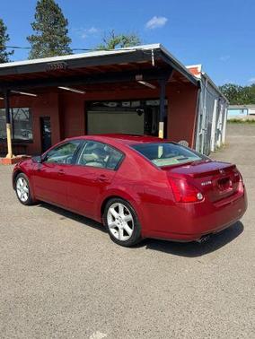 Red 2004 Nissan Maxima SE