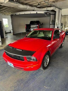 Red 2007 Ford Mustang Deluxe