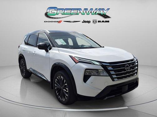 Everest White Pearl/Super Black 2024 Nissan Rogue Platinum