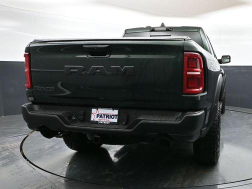 Serrano Green Metallic 2026 RAM 1500 RHO Crew Cab 4x4 5'7' Box
