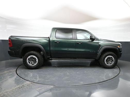 Serrano Green Metallic 2026 RAM 1500 RHO Crew Cab 4x4 5'7' Box