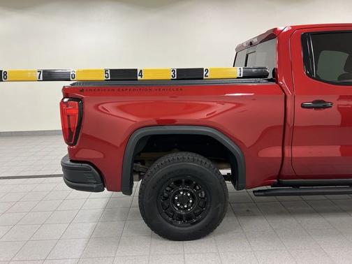 Volcanic Red 2023 GMC Sierra 1500 AT4X