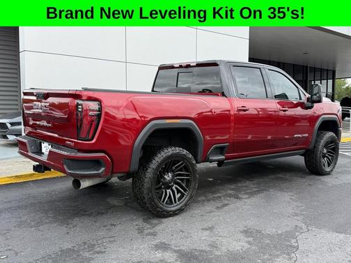 Volcanic Red Tintcoat 2025 GMC Sierra 2500 AT4