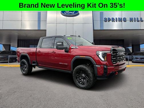 Volcanic Red Tintcoat 2025 GMC Sierra 2500 AT4