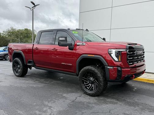 Volcanic Red Tintcoat 2025 GMC Sierra 2500 AT4